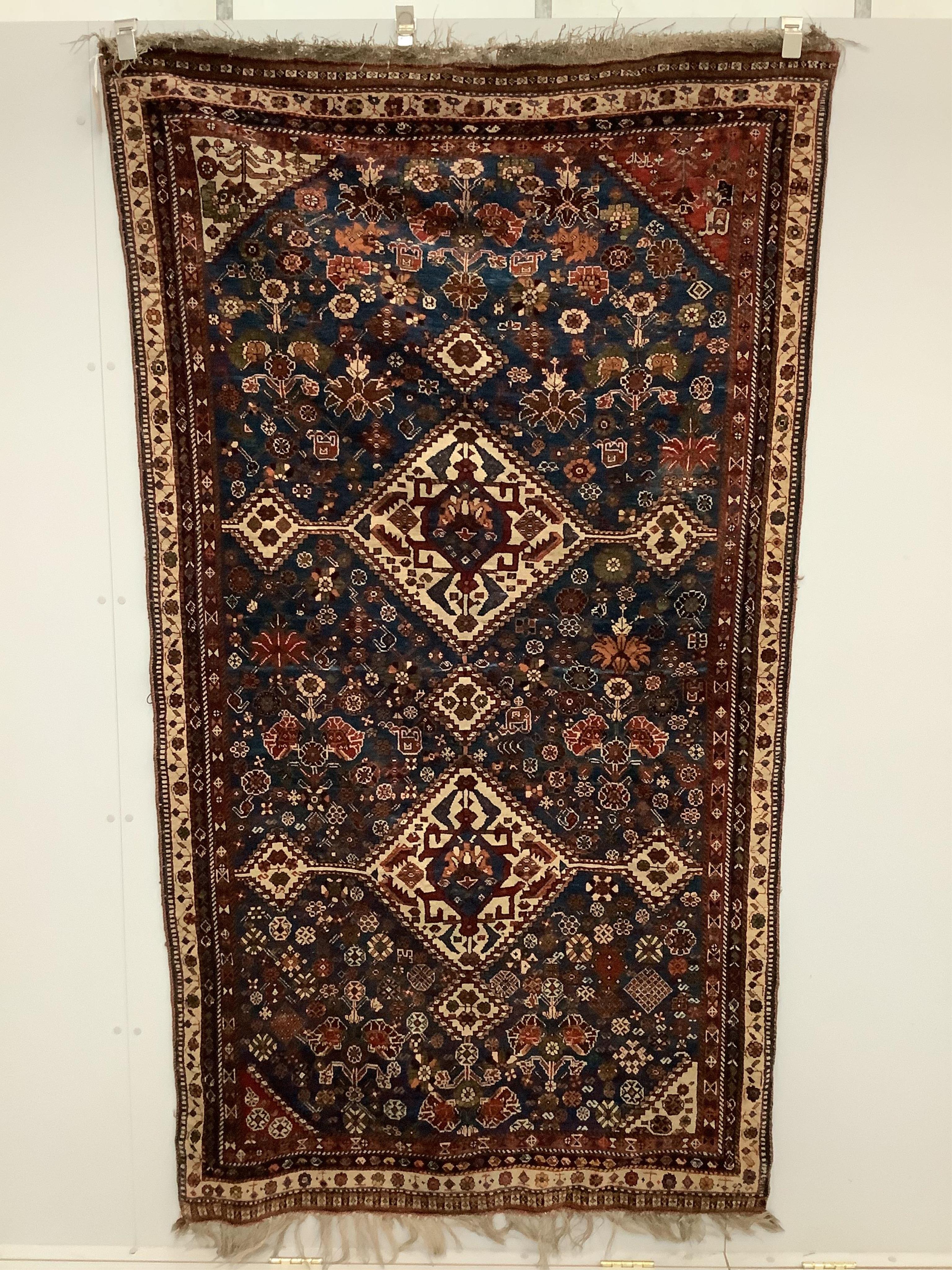 A Qashqai blue ground rug, 220 x 130cm